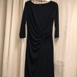 Black dress with metallic accents and knot detail